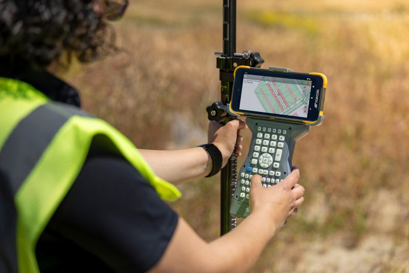 Topcon FC-700 Data Collector In the Field With Keyboard