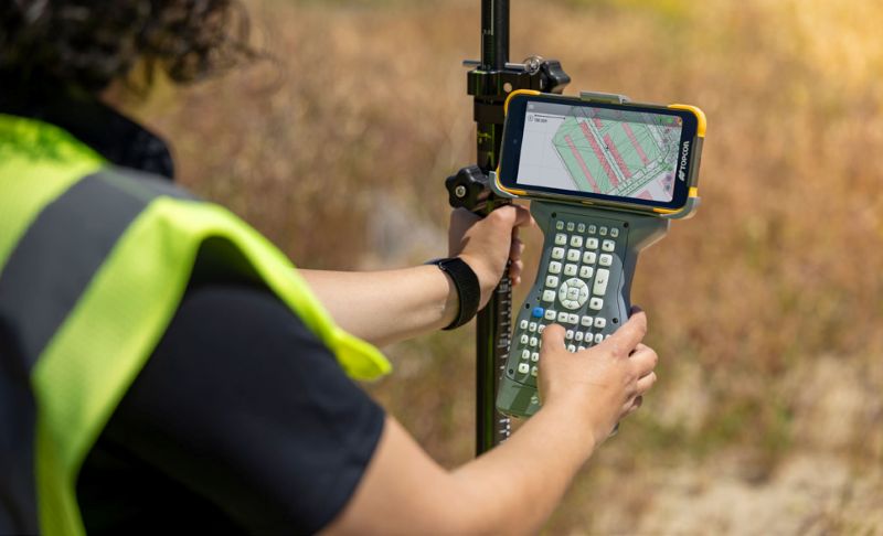 Topcon FC-700 Data Collector In the Field With Keyboard