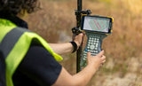 Topcon FC-700 Data Collector In the Field With Keyboard